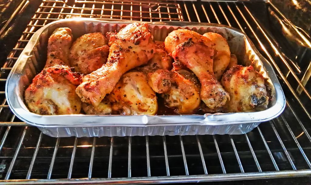 Homemade roasted chicken in oven whit spices.