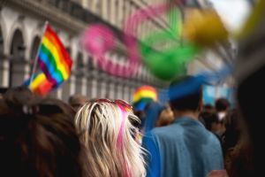 Rear View Of People Walking In Gay Pride Parade