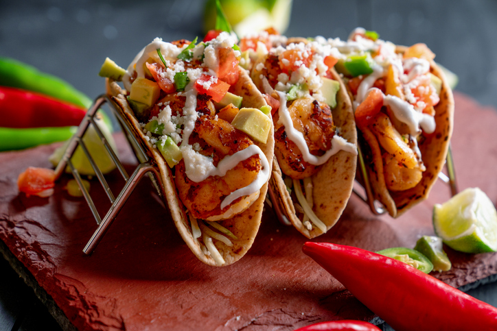 A Platter With Three Gourmet Shrimp Tacos With Mango Habanero Salsa
