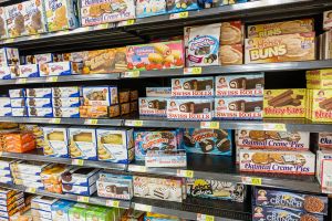 Walmart shelves selling junk food.