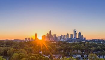 NORTH CAROLINA Distant view of a skyline during sunset in Charlotte, North Carolina, United States