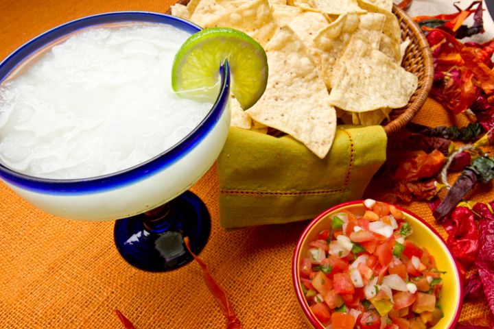 Margarita with lime and chips with salsa